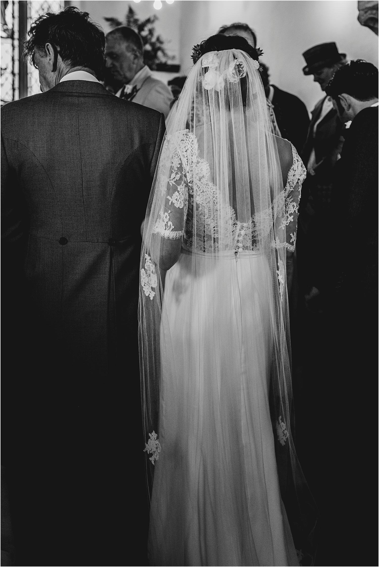 veil and wedding dress by Louise Selby