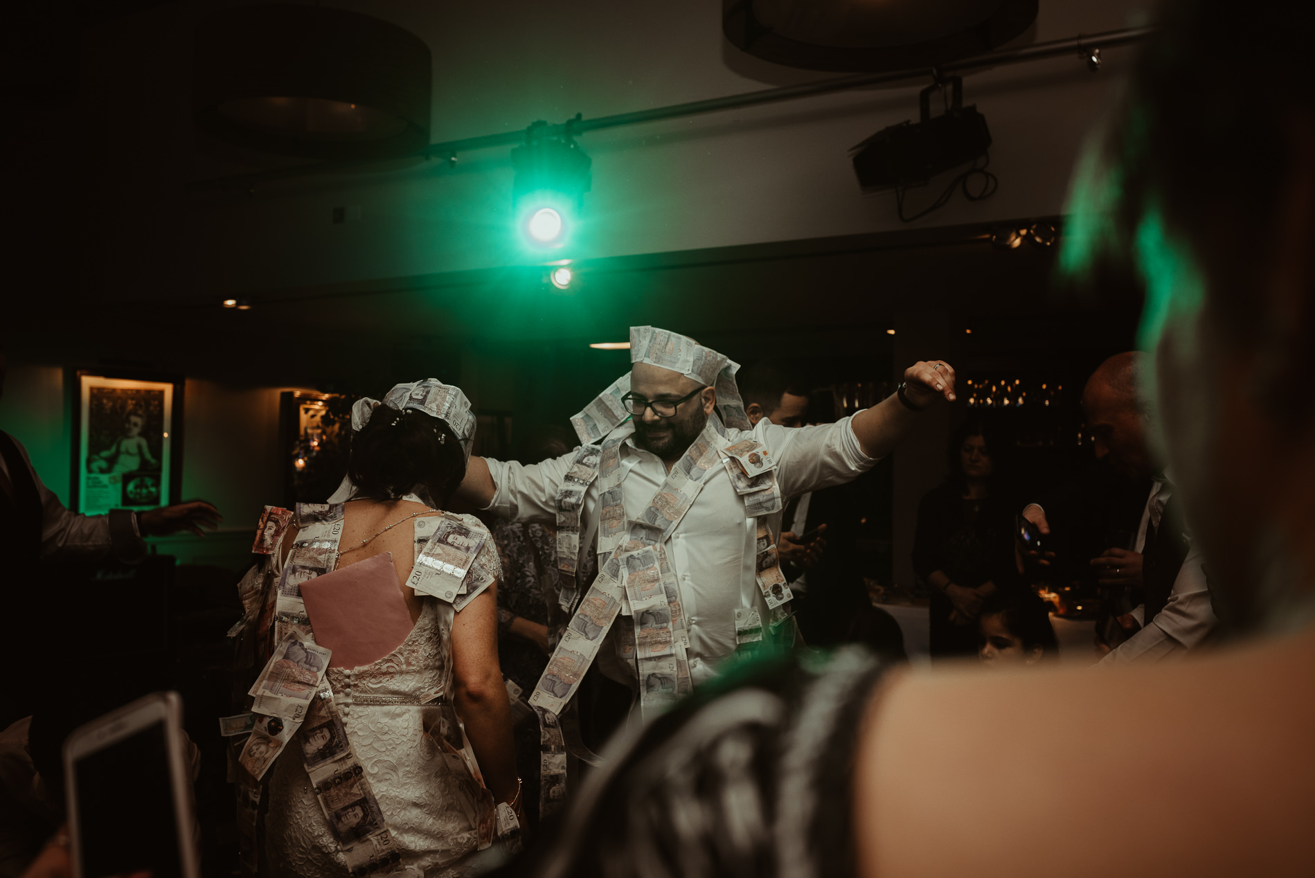 Couple greek money dance at Lion Inn Boreham wedding
